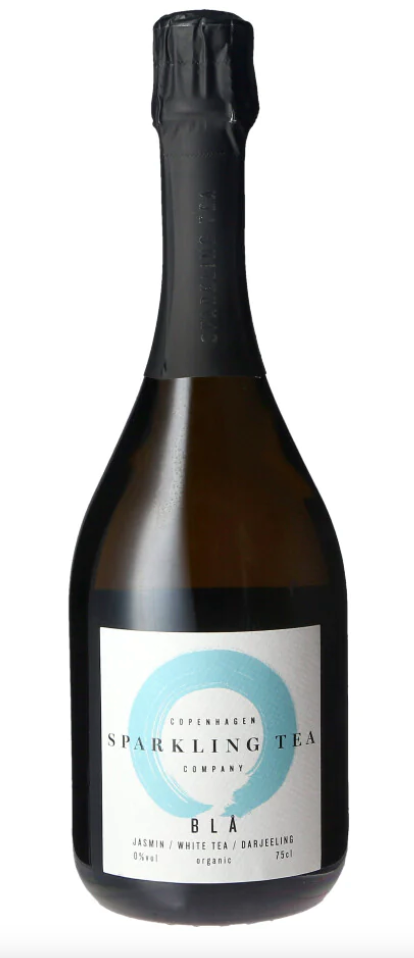 A bottle of Copenhagen Company Sparkling Tea Bla Alcohol Free with a label that includes the brand name and the product line 'SPARKLING TEA' next to a floral icon, indicating it's a jasmine/white tea/darjeeling blend.