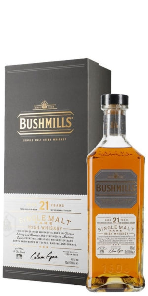 Bushmills 21 Year Single Malt Irish Whiskey bottle with its dark gray and white presentation box, shown on a clean white background. by Whelehans Wines