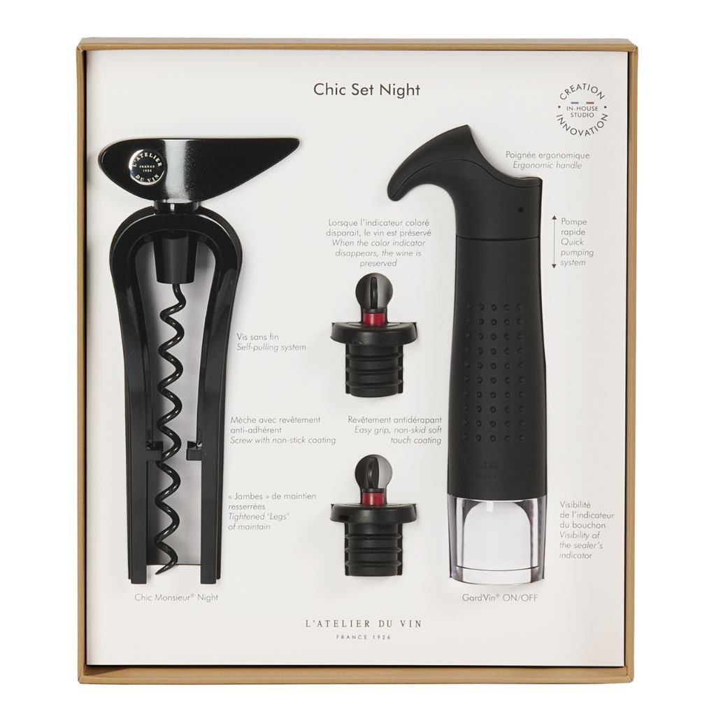 Wine accessory set with corkscrew, bottle stopper, and vacuum pump in a box on a white background