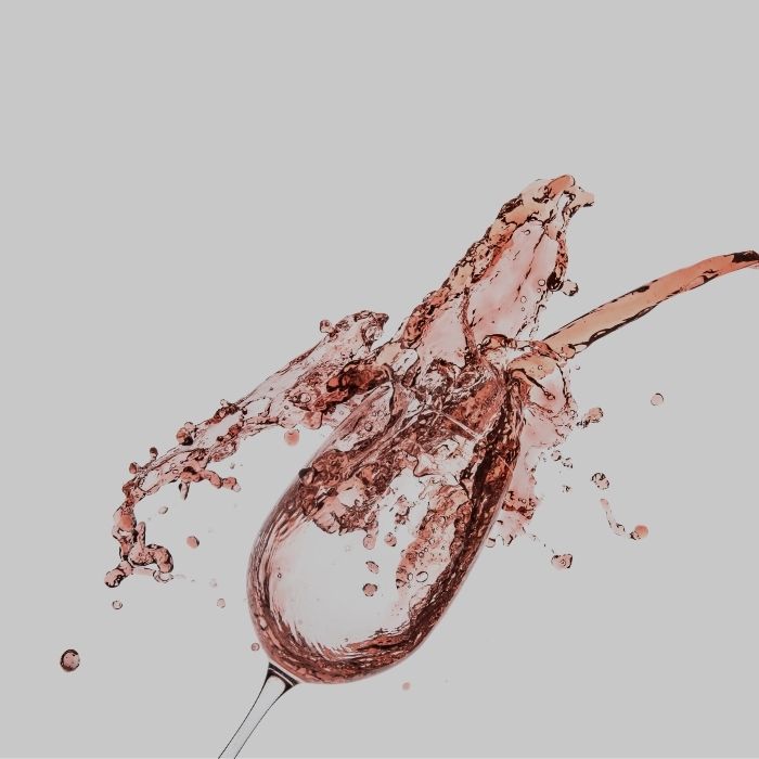 A glass of rosé wine illustrating the rosé wine collection by Whelehans Wines.