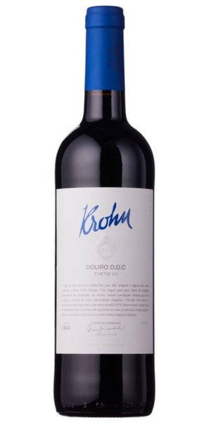 A bottle of Krohn Douro D.O.C. Tinto red wine with a white label and a blue foil cap, shown against a plain white background.