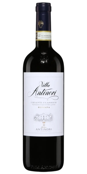 A bottle of Villa Antinori Chianti Classico Riserva red wine, featuring a dark glass bottle with a white label and a dark blue foil seal, isolated on a white background. By Whelehans Wines. 