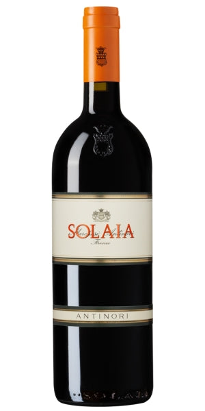 Solaia wine bottle with an orange cap on a white background by Whelehans Wines. 